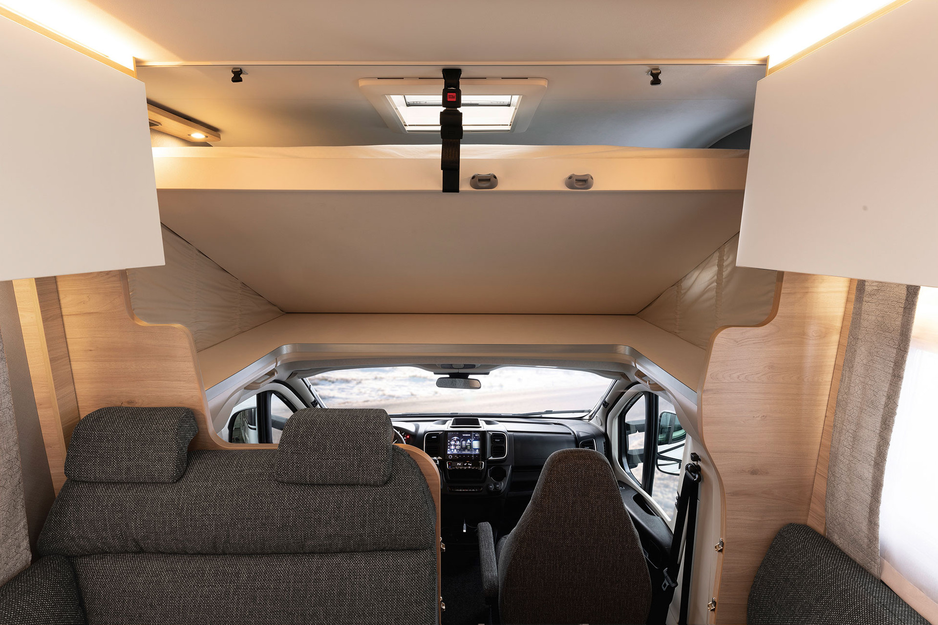 The overcab bed base can be folded up for easy access to the cab.