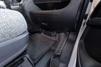 The cab is additionally heated using hot-water convectors piped to the interior heating system.